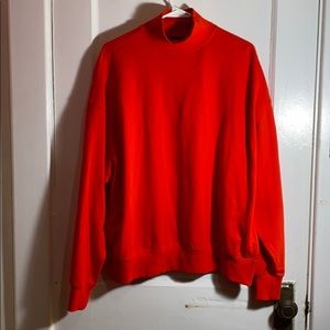 Red turtleneck sweater